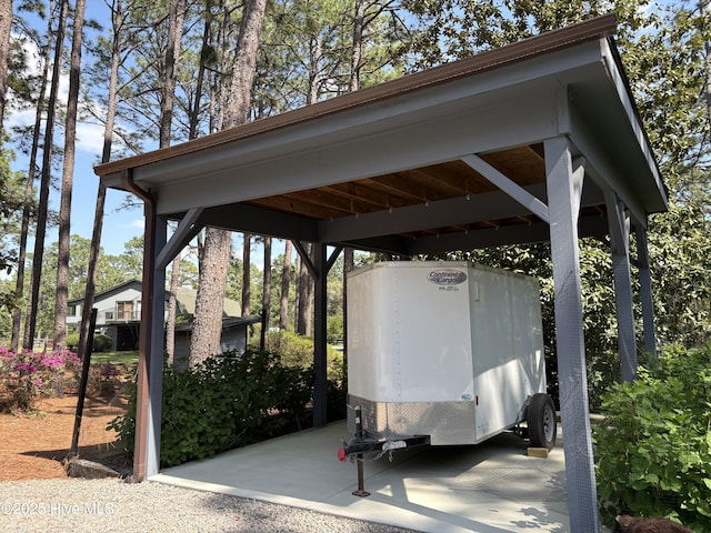 207 Bump A Long Ln, Southern Pines, NC 28387 - view of parking / parking lot featuring a detached carport