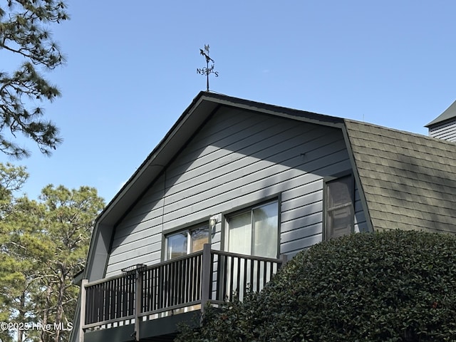 207 Bump A Long Ln, Southern Pines, NC 28387 - view of property exterior featuring a gambrel roof