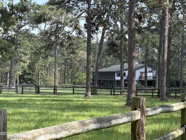 207 Bump A Long Ln, Southern Pines, NC 28387 - view of community with a yard, fence, and a wooded view