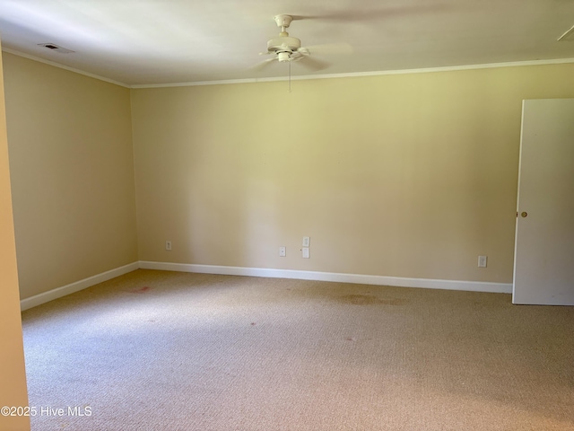 207 Bump A Long Ln, Southern Pines, NC 28387 - carpeted spare room with visible vents, baseboards, crown molding, and ceiling fan