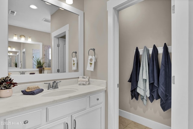 bathroom with tile patterned floors, vanity, and visible vents