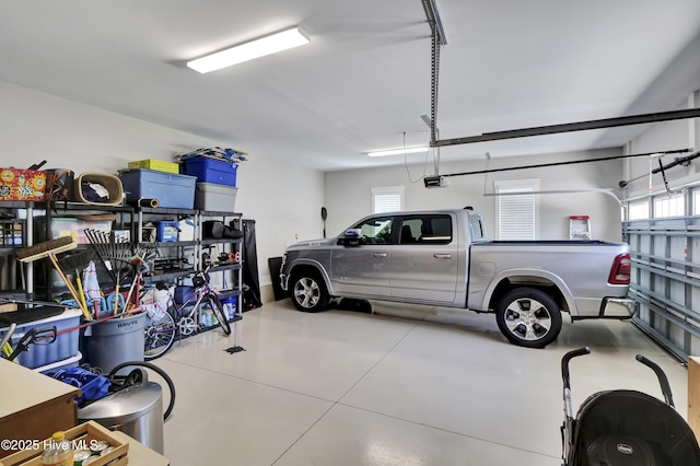 garage featuring a garage door opener