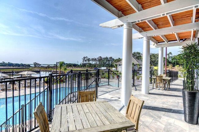 view of patio featuring a community pool