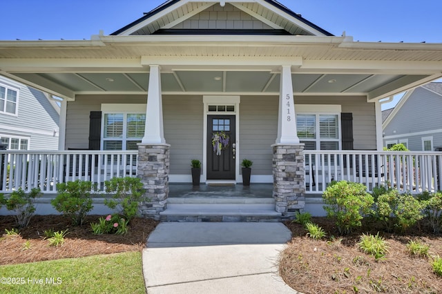 entrance to property with covered porch
