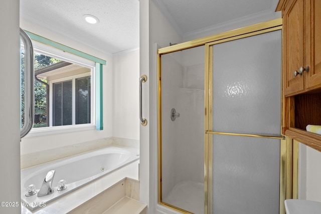 full bath featuring ornamental molding, a whirlpool tub, a stall shower, and a textured ceiling