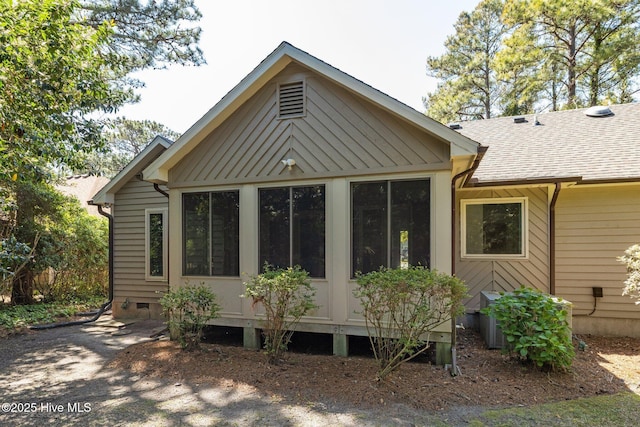 back of property with crawl space