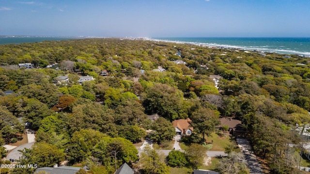 bird's eye view with a forest view and a water view