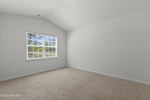 5900 Santo Domingo Ct, New Bern, NC 28560 - carpeted empty room featuring baseboards, vaulted ceiling, and visible vents