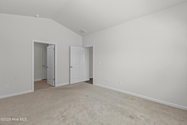 5900 Santo Domingo Ct, New Bern, NC 28560 - unfurnished bedroom with carpet floors, baseboards, vaulted ceiling, and visible vents
