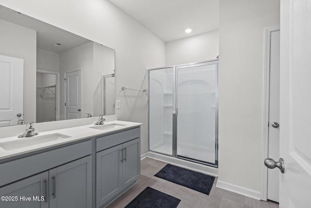 5900 Santo Domingo Ct, New Bern, NC 28560 - bathroom with a sink, a shower stall, and double vanity