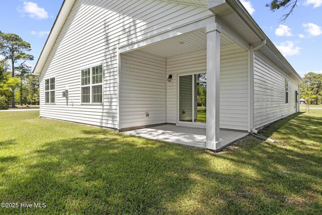 5900 Santo Domingo Ct, New Bern, NC 28560 - rear view of property featuring a patio and a yard