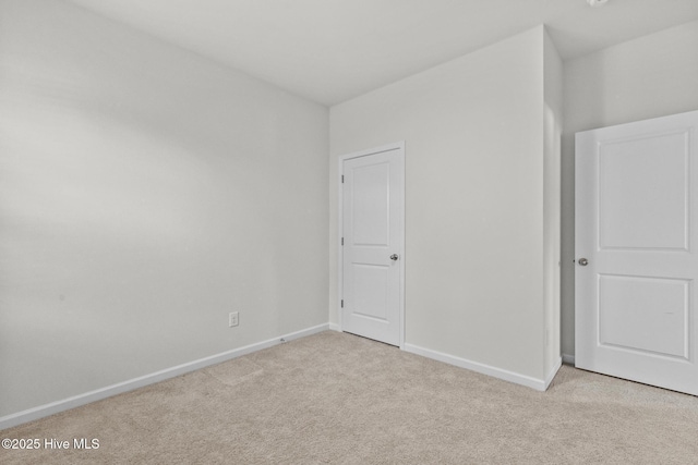 5900 Santo Domingo Ct, New Bern, NC 28560 - unfurnished bedroom featuring baseboards and carpet flooring