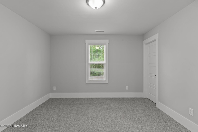 761 Cypress Village Pl, Wilmington, NC 28412 - carpeted empty room with visible vents and baseboards