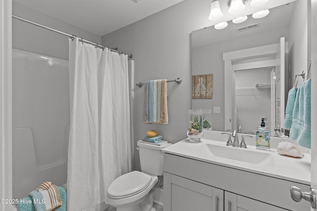 761 Cypress Village Pl, Wilmington, NC 28412 - bathroom featuring curtained shower, visible vents, toilet, and vanity