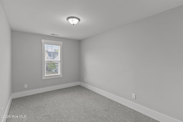 761 Cypress Village Pl, Wilmington, NC 28412 - carpeted spare room with baseboards and visible vents
