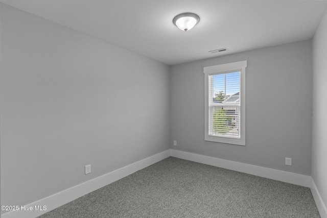761 Cypress Village Pl, Wilmington, NC 28412 - carpeted spare room with baseboards and visible vents