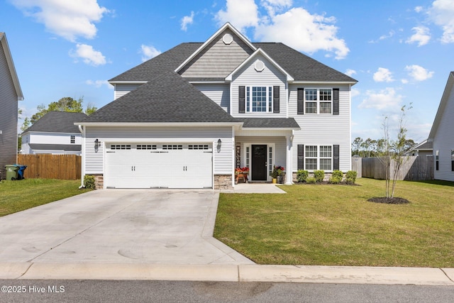 506 White Shoal Way, Sneads Ferry, NC 28460 - craftsman-style home with concrete driveway, an attached garage, fence, and a front yard