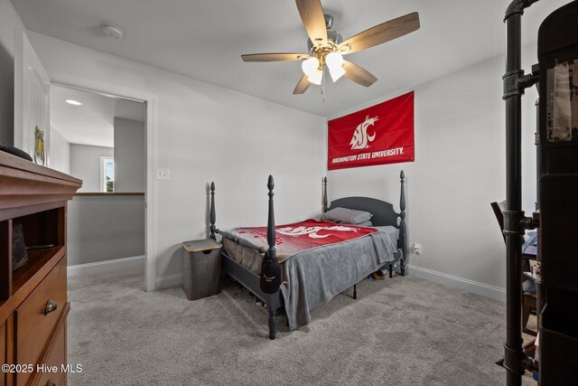 506 White Shoal Way, Sneads Ferry, NC 28460 - carpeted bedroom with a ceiling fan and baseboards