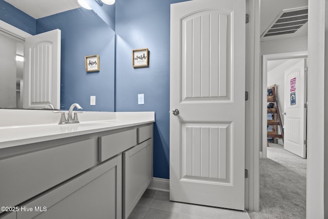 506 White Shoal Way, Sneads Ferry, NC 28460 - bathroom with baseboards, visible vents, tile patterned floors, and vanity