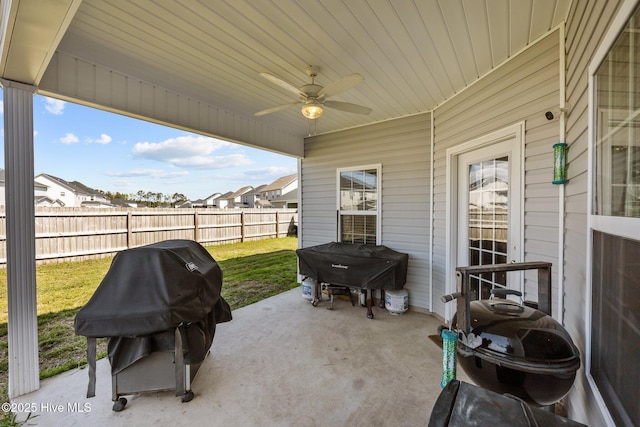 506 White Shoal Way, Sneads Ferry, NC 28460 - view of patio / terrace featuring a ceiling fan, fence, a residential view, and a grill