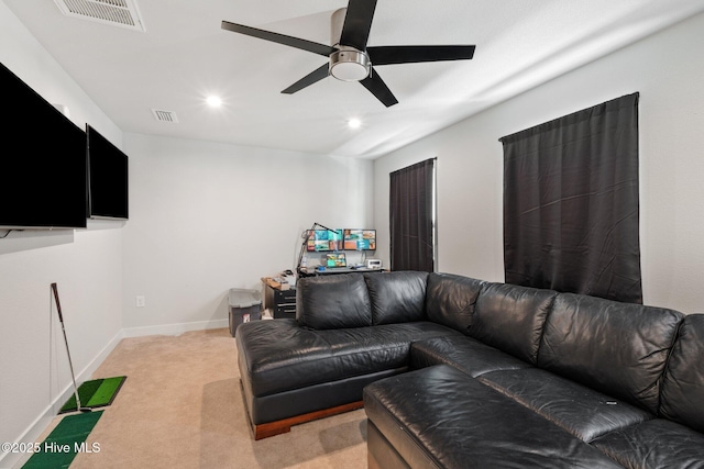 living area with light carpet, recessed lighting, visible vents, and a ceiling fan