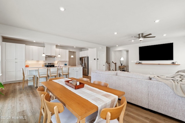 dining room featuring recessed lighting, light wood-style floors, and ceiling fan