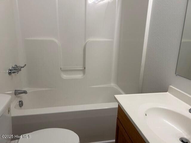409 E Broad St, Elizabeth City, NC 27909 - full bathroom featuring shower / bath combination, vanity, and toilet