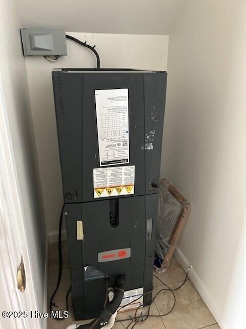 409 E Broad St, Elizabeth City, NC 27909 - utility room featuring heating unit