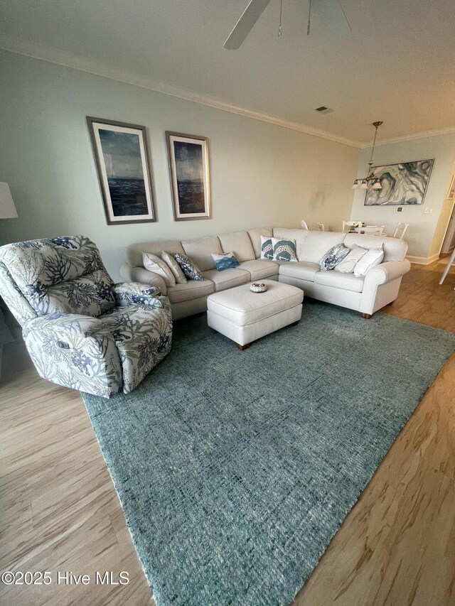 7265 Seashell Ln SW Unit 303, Ocean Isle Beach, NC 28469 - bedroom with wood finished floors, baseboards, and ceiling fan