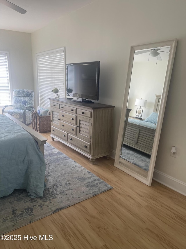 7265 Seashell Ln SW Unit 303, Ocean Isle Beach, NC 28469 - bedroom featuring wood finished floors and baseboards
