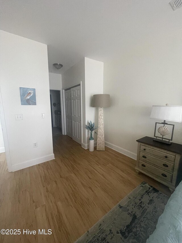 7265 Seashell Ln SW Unit 303, Ocean Isle Beach, NC 28469 - bedroom with dark carpet and ceiling fan