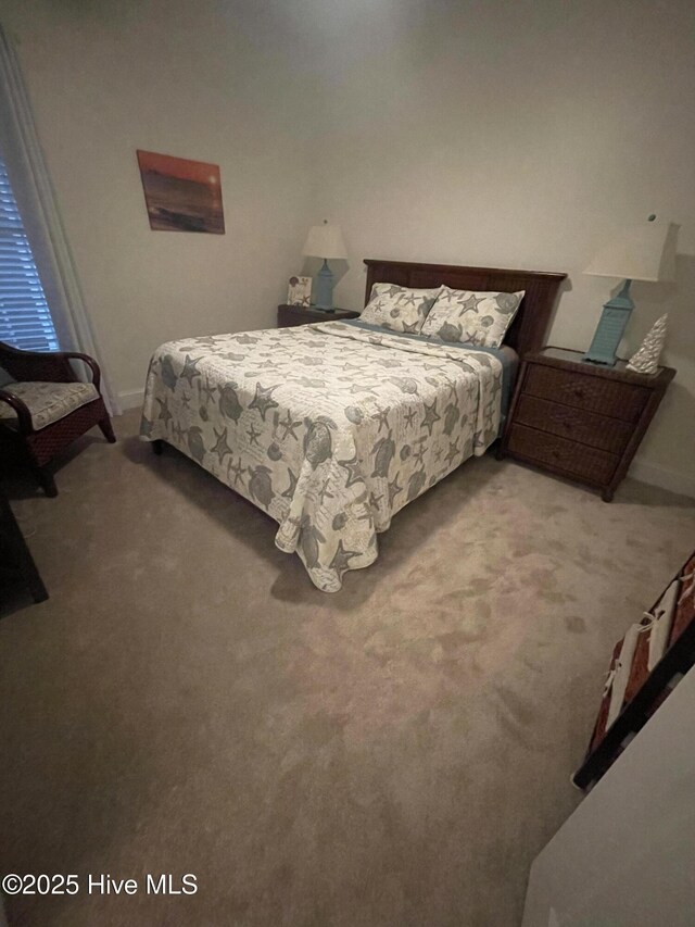 7265 Seashell Ln SW Unit 303, Ocean Isle Beach, NC 28469 - clothes washing area featuring washing machine and dryer and light tile patterned flooring