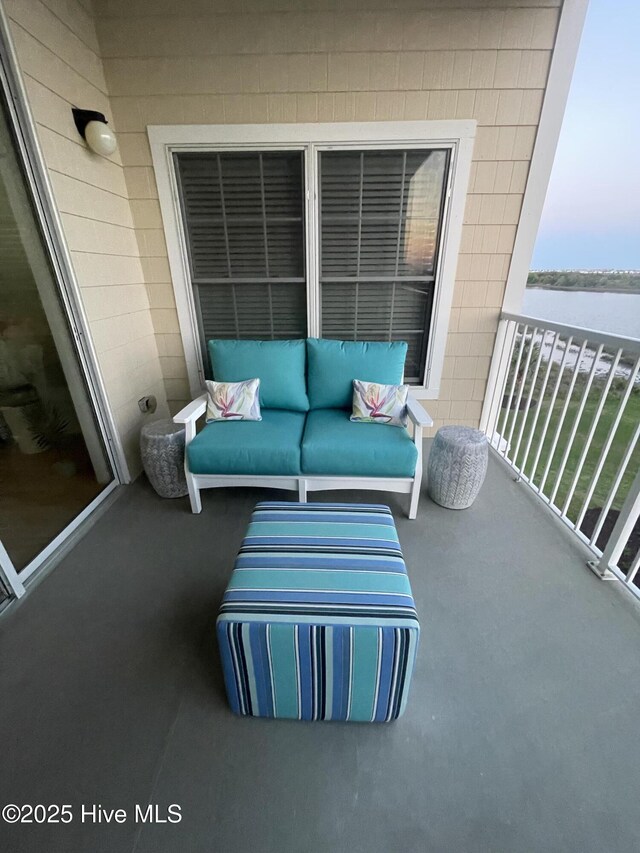 7265 Seashell Ln SW Unit 303, Ocean Isle Beach, NC 28469 - view of home's community featuring a water view, a lawn, a patio area, and a swimming pool