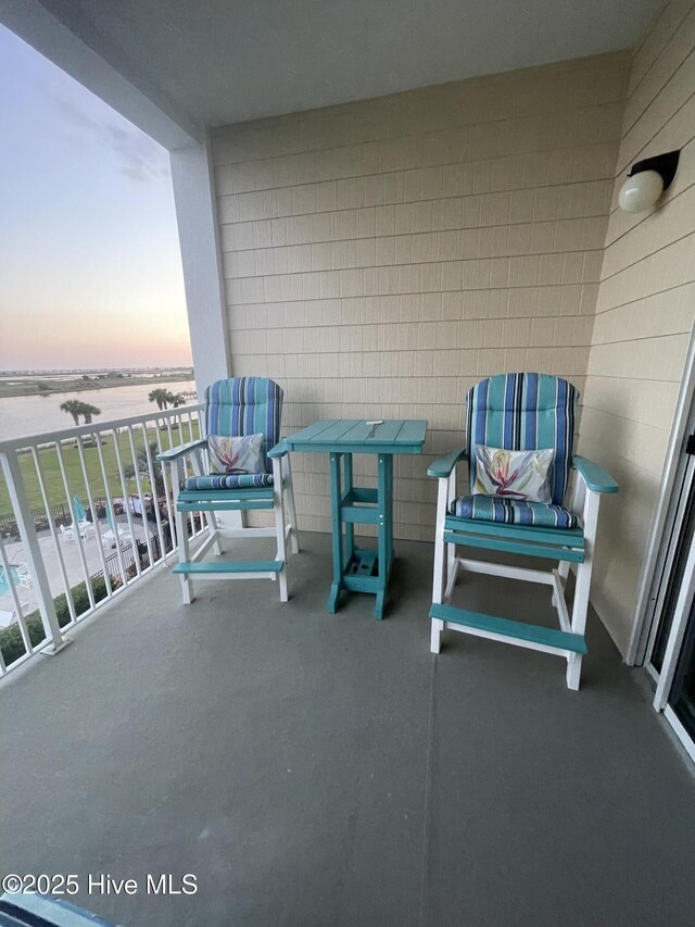 7265 Seashell Ln SW Unit 303, Ocean Isle Beach, NC 28469 - corridor with wood finished floors and baseboards
