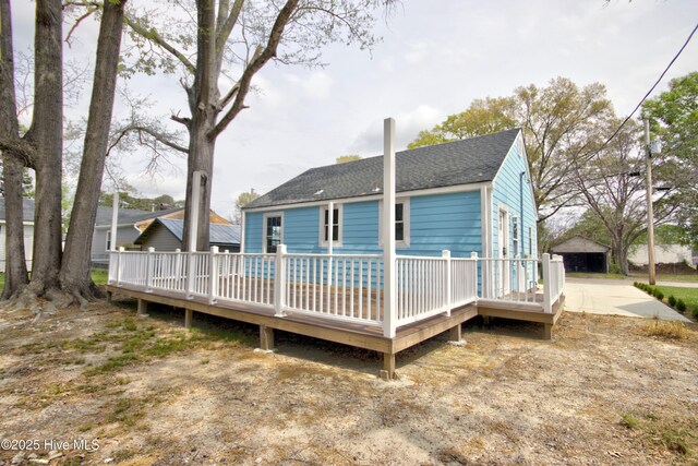 504 Belmont Ave SW, Wilson, NC 27893 - rear view of property featuring a wooden deck and a shingled roof