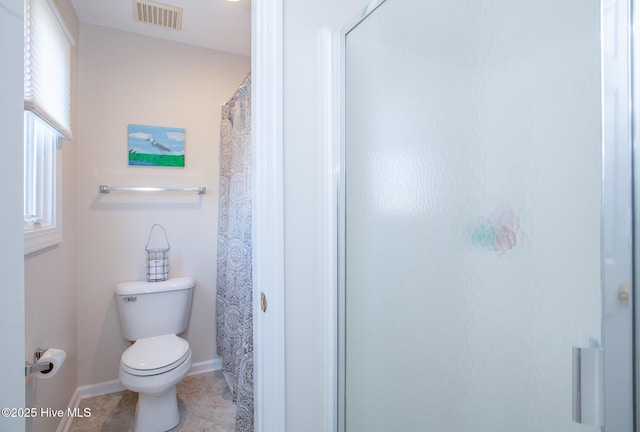 101 Beaufort Walk, Beaufort, NC 28516 - full bathroom featuring baseboards, tile patterned flooring, a shower with curtain, toilet, and visible vents