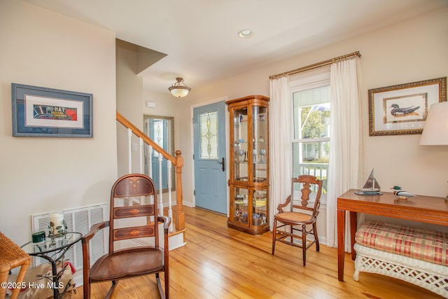 101 Beaufort Walk, Beaufort, NC 28516 - living area featuring light wood-style flooring, stairway, and recessed lighting