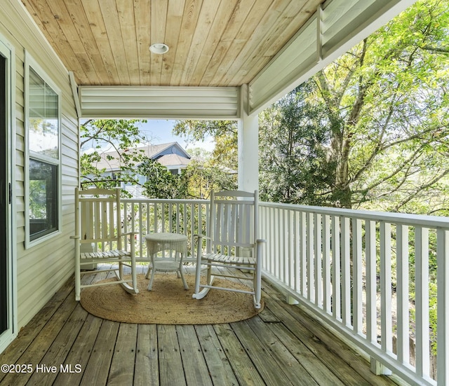 wooden deck featuring a porch