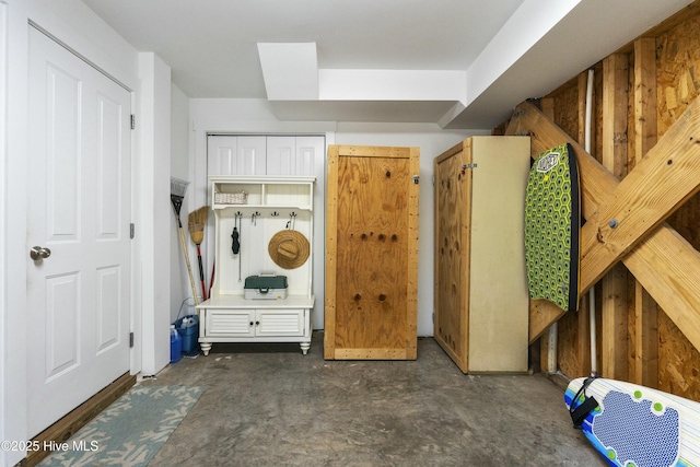 mudroom featuring unfinished concrete flooring