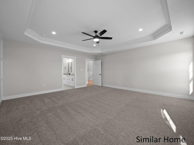 295 E Ivybridge Dr, Hubert, NC 28539 - unfurnished bedroom with a tray ceiling, crown molding, recessed lighting, carpet flooring, and ensuite bath