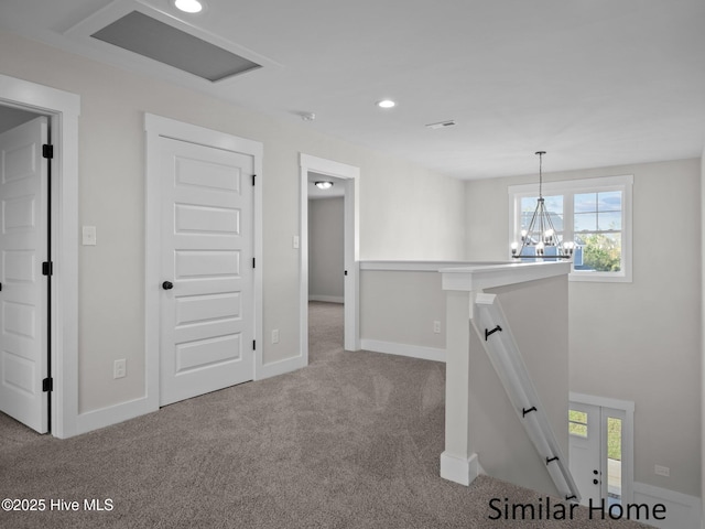 295 E Ivybridge Dr, Hubert, NC 28539 - corridor featuring an upstairs landing, carpet, recessed lighting, and a chandelier