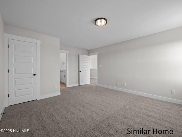 295 E Ivybridge Dr, Hubert, NC 28539 - unfurnished bedroom with carpet flooring and connected bathroom