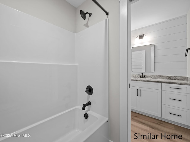 295 E Ivybridge Dr, Hubert, NC 28539 - full bathroom with tub / shower combination, vanity, and wood finished floors