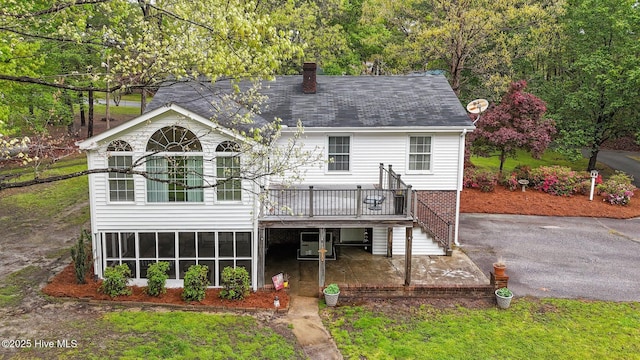 379 Greenbrier Rd, Tarboro, NC 27886 - back of house featuring stairway, a deck, and a chimney