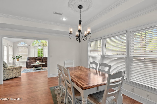 379 Greenbrier Rd, Tarboro, NC 27886 - dining room with visible vents, baseboards, an inviting chandelier, and wood finished floors