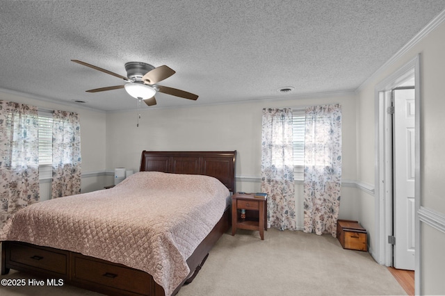 379 Greenbrier Rd, Tarboro, NC 27886 - bedroom featuring a ceiling fan, visible vents, multiple windows, and a textured ceiling