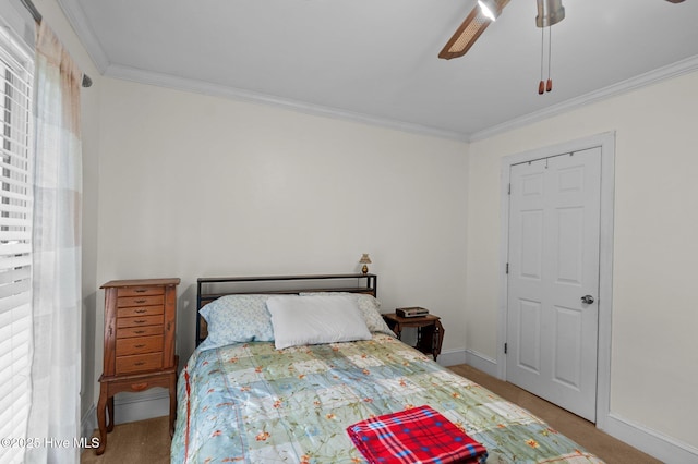 379 Greenbrier Rd, Tarboro, NC 27886 - carpeted bedroom with ceiling fan, baseboards, and ornamental molding