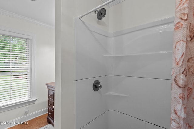 379 Greenbrier Rd, Tarboro, NC 27886 - full bath with baseboards, walk in shower, crown molding, and wood finished floors