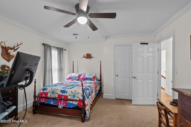 379 Greenbrier Rd, Tarboro, NC 27886 - bedroom featuring ornamental molding, baseboards, a ceiling fan, and carpet