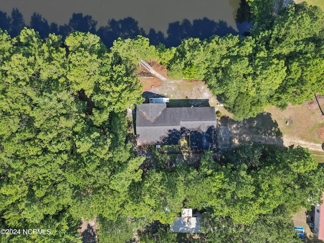 drone / aerial view with a view of trees